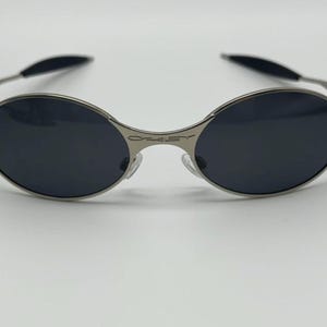 小物 Oakley C-Wire X-l Oval Sunglasses oakley c wire archive 90s 00s FRAME COLOR: Platinum LENS COLOR