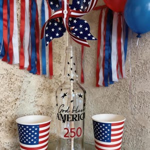 May include: A set of three ceramic nesting bowls in shades of blue, green, and white. The bowls have a speckled glaze and a simple, modern design. The largest bowl is about 15 cm in diameter.