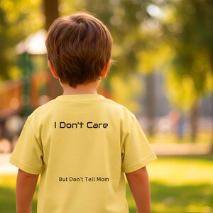 I Don't Care... Don't Tell Mom Youth Tee | Funny Kids Shirt, Sassy Back Print Playful Trouble  Laugh Classic Roomy Cut T-Shirt Mischievous