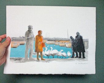 May include: Watercolor painting depicting a waterfront scene with figures and swans. The artwork features a person in an orange coat, gray figures, and a group of white swans on a turquoise blue water background. The painting is held by a hand.