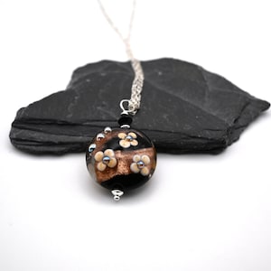 handmade lampwork glass black and goldstone flower pendant necklace