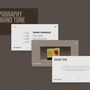 Könnte beinhalten: Ein Set aus drei Keramikbechern mit gesprenkelter, matter Oberfläche. Die Becher sind in Creme-, Hellgrau- und Dunkelgrautönen gehalten. Jeder Becher hat ein schlichtes, minimalistisches Design und einen abgerundeten Griff.