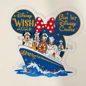 May include: A die-cut sticker featuring Disney characters on a cruise ship. The sticker is shaped like Mickey Mouse ears, with the words "Disney Wish 2026" and "Our 1st Disney Cruise" in gold lettering. A red bow with white polka dots is in the centre.
