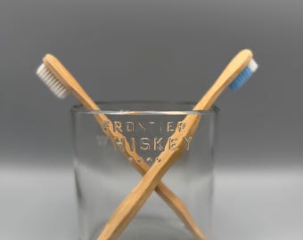 Toothbrush holder made from Upcycled Bulliet Bourbon bottle.
