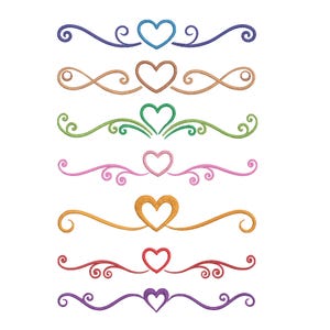May include: A collection of seven embroidered heart designs in various colors. Each design features a heart shape at the center, with swirling embellishments on either side. Colors include blue, brown, green, pink, gold, red, and purple.