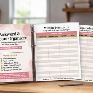 May include: A password and account organizer with a pink and white design. The binder includes pages for website passwords, email accounts, subscriptions, bank accounts, social media, and emergency contacts. The text "Password & Account Organizer" is displayed on the cover.