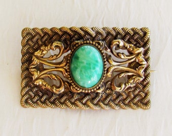 Antique brass sash pin with Peking glass cabochon