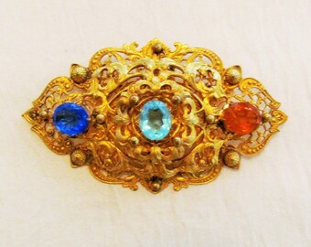 Vintage Victorian Revival brooch, large filigree pin with multi colored unfoiled stones