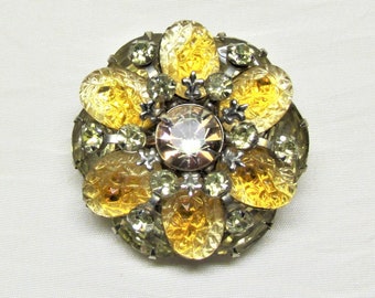 Vintage brooch with molded cabochons