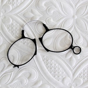 Antique pince nez, folding spectacles with hard rubber frames, late 1800&#39;s