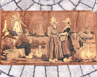 Vintage throw rug or wall hanging with Dutch scene: windmill, sailboats, Dutch ladies and fishermen