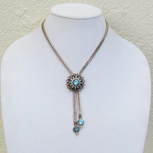 Vintage 1950&#39;s Coro necklace with adjustable length pendant, aqua rhinestones and black enamel