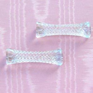 Pair of small cut glass knife rests