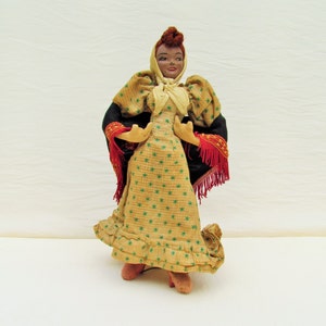 1940's Spanish doll, "chulapa" doll wearing traditional dress of Madrid, cloth body female doll with composition head