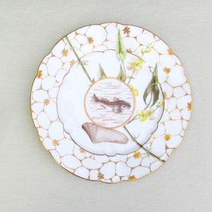 Haviland Limoges plate with hand painted fish and seaweed