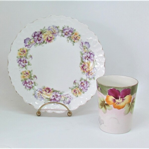 2 pieces of pansy-decorated china, shabby vintage plate and hand-painted cup