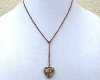 Vintage heart-shaped locket with cartouche for engraving
