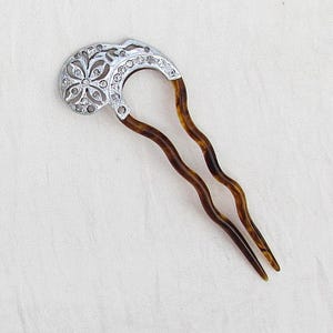Antique decorative hair pin; celluloid, aluminum, and rhinestone hair ornament