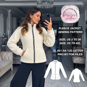 May include: A cream-coloured fleece jacket with a high collar, long sleeves, and a central black zip. The jacket features a front kangaroo pocket. Text on the image reads: FLEECE JACKET SEWING PATTERN, SIZE; US 2 TO 30, SIZE; XS TO 4XL, A0 / A4 / US LETTER PROJECTOR FILES.