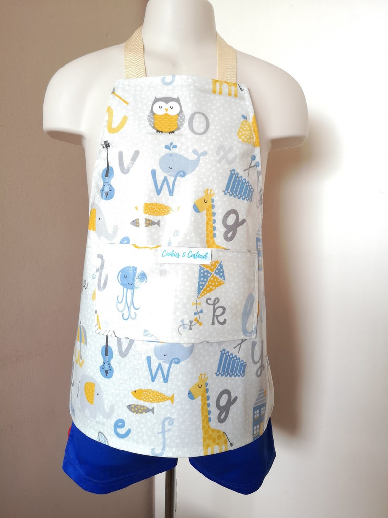 DOGS ADULT AND CHILDS 100/% COTTON COATED PVC OILCLOTH APRONS 5 SIZES WIPE CL