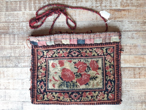 Vintage carpet camel bag . Tribal knotted wool tap