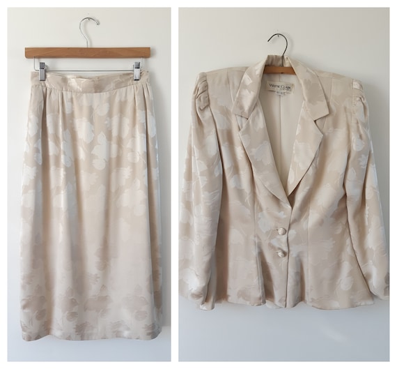 Wayne Clark cream silk two piece jacket and skirt.