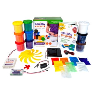 May include: A Squishy Circuits Green Energy Kit, including colourful play dough, a solar panel, and electronic components. The kit features a booklet titled "Exploring Green Energy".