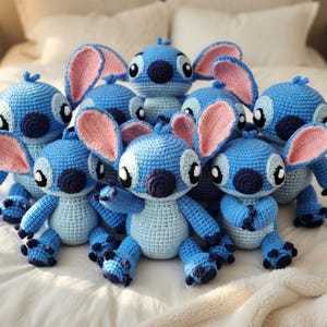 May include: A white ceramic mug with a black handle and the text "But First, Coffee" in a bold, black font. The mug is on a wooden surface. The mug is approximately 10 cm tall.