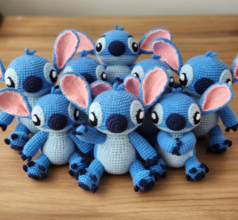 May include: A set of three ceramic mugs with a speckled, matte finish in cream, light grey, and dark grey. Each mug has a simple, modern design and a rounded handle.