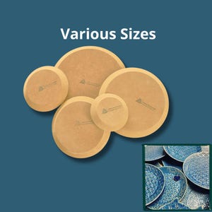 May include: Five circular tan wooden boards of various sizes arranged in a cluster, each featuring a small logo stamp. Below, a rectangular inset displays several blue ceramic plates with intricate white patterns and a small heart-shaped icon.