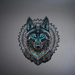 May include: A sticker featuring a detailed illustration of a wolf head centered within a circular geometric frame. The design incorporates black, white, and bright cyan blue lines with intricate patterns, including feather-like shapes at the base.