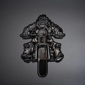 May include: A black and white graphic patch featuring a gorilla wearing a bandana and smoking a cigar while riding a motorcycle. The illustration shows the gorilla from the front, gripping the handlebars with both hands, centered on a dark background.