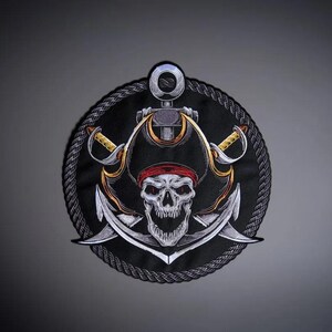 May include: A circular embroidered patch featuring a skull wearing a red bandana, positioned in front of a silver anchor and two crossed swords. The design is framed by a thick, dark rope border, rendered in shades of black, white, and gold.