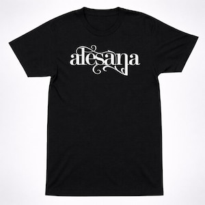 May include: Black t-shirt with the white text "alesana" in a decorative font. The word is centered on the front of the shirt. The shirt has short sleeves and a crew neck.