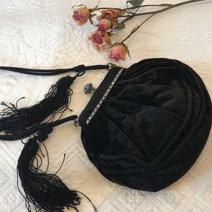 Vintage Black Velvet Corded Edges Evening Bag. Row Rhinestones and Latch Closure. Cord Handle and Tassels. Silk Lined. Floating Coin Purse.