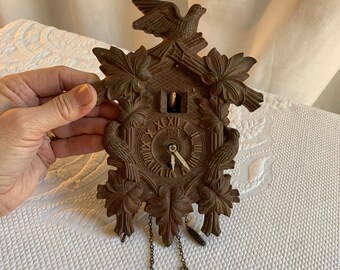 Vintage Lux Cuckoo Clock. Small Plastic Faux Wood Clock with Birds and Leaves and Bird in Window. Not Working But Charming Display.