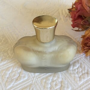 Vintage 1970s Prince Matchabelli Wind Song Creme Perfume. Crown Shaped Bottle With Screw On Top.