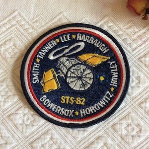 Vintage NASA STS-82 Space Shuttle Patch, Names Stitched: Smith, Tanner, Lee, Harbaugh, Bowersox, Horowitz and Hawley. NASA Mission Patch.