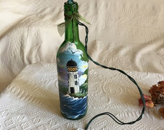 Lighthouse Hand Painted Wine Bottle With Lights Inside. Green Bottle With Ocean and Clouds Scene of Lighthouse. Lovely!