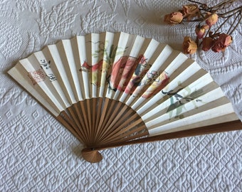 Vintage Wood and Paper Fan with Oriental Pink Floral Type Design. Pink and Green on White with Figures on One Side. Beautiful Paper Fan.