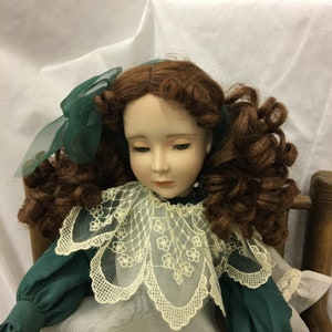 Vintage 19&quot; Porcelain Doll. Reddish Brown Long Curls, Green Eyes, Porcelain Head, Upper Chest, Below Elbow and Below Knees. Painted Shoes.