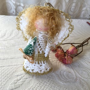 Handmade Lacey Angel. Angel from Lace White and Gold Doily. Angel With Wings Carrying a Little Tree.
