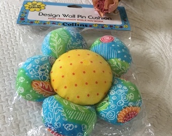 Design Wall Pin Cushion. This Listing is For One Design Wall Pin Cushion. Use Flat or Hanging. Hanging Loop on Back.