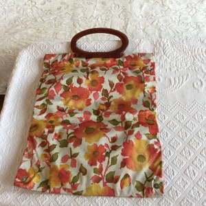 Vintage Silk Feel Shopping Bag with Celluloid Handle and Plastic Lining. Orange, Green and Yellow Floral Design w/ Round Celluloid Handles.