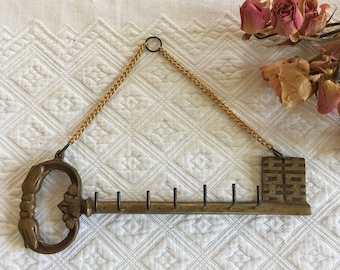 Ganchos de pared para llaves grandes vintage para usos múltiples. Llave de oro fundido con 7 ganchos para colgar llaves dentro de la puerta. Exhibición de joyas, ganchos para paraguas, etc.