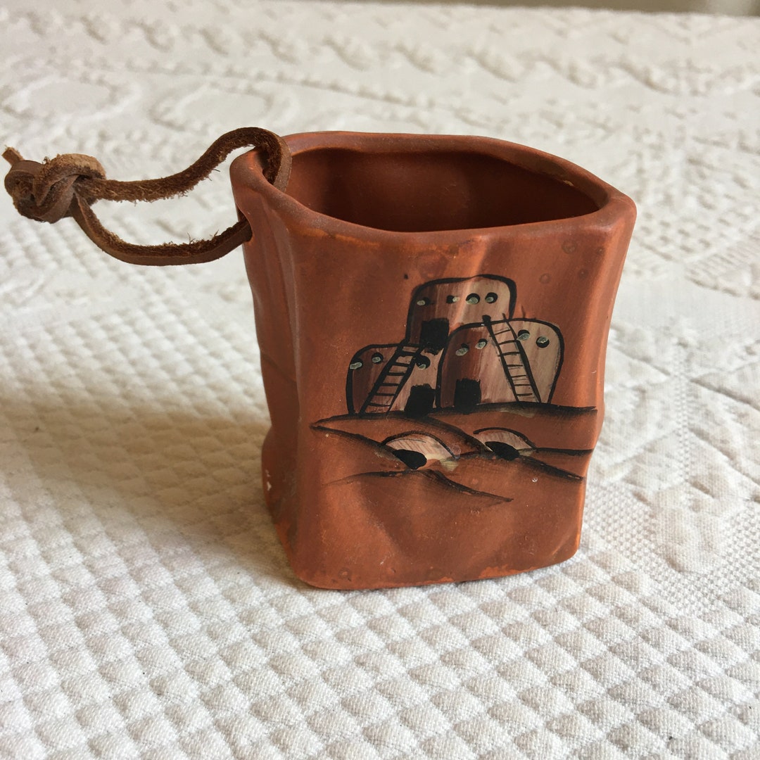 Vintage Clay Pot Look Bag Shaped Small Vase With Leather Strap. Says