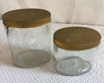 Vintage Oval Glass Jars in Two Sizes. Listing for One Jar. Metal Lid with Rubber Seal on Rim. Charming Shape. Great for Use or Display.