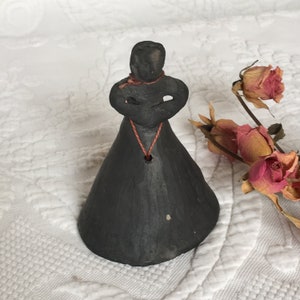 Antique Victorian Hand Formed Lady Black Clay Bell. Bell Has a Nice High Tinkling Sound. Outside String Holds Bell Knocker.