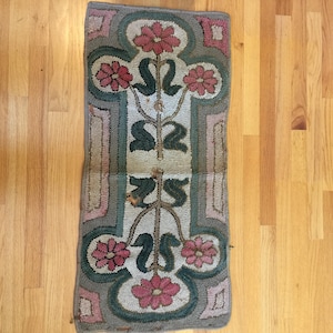 Antique Punched Floral Rug. Great for Use as a Wall Hangng. Some Holes from Wear and Age But Beautiful! 19" X 40".