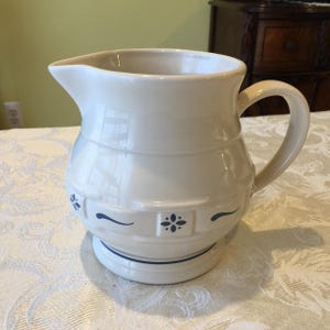 Vintage Longaberger Pottery Pitcher with Blue Designs on Basket Weave Belt and Blue Border. All Cooking and Storage Safe.